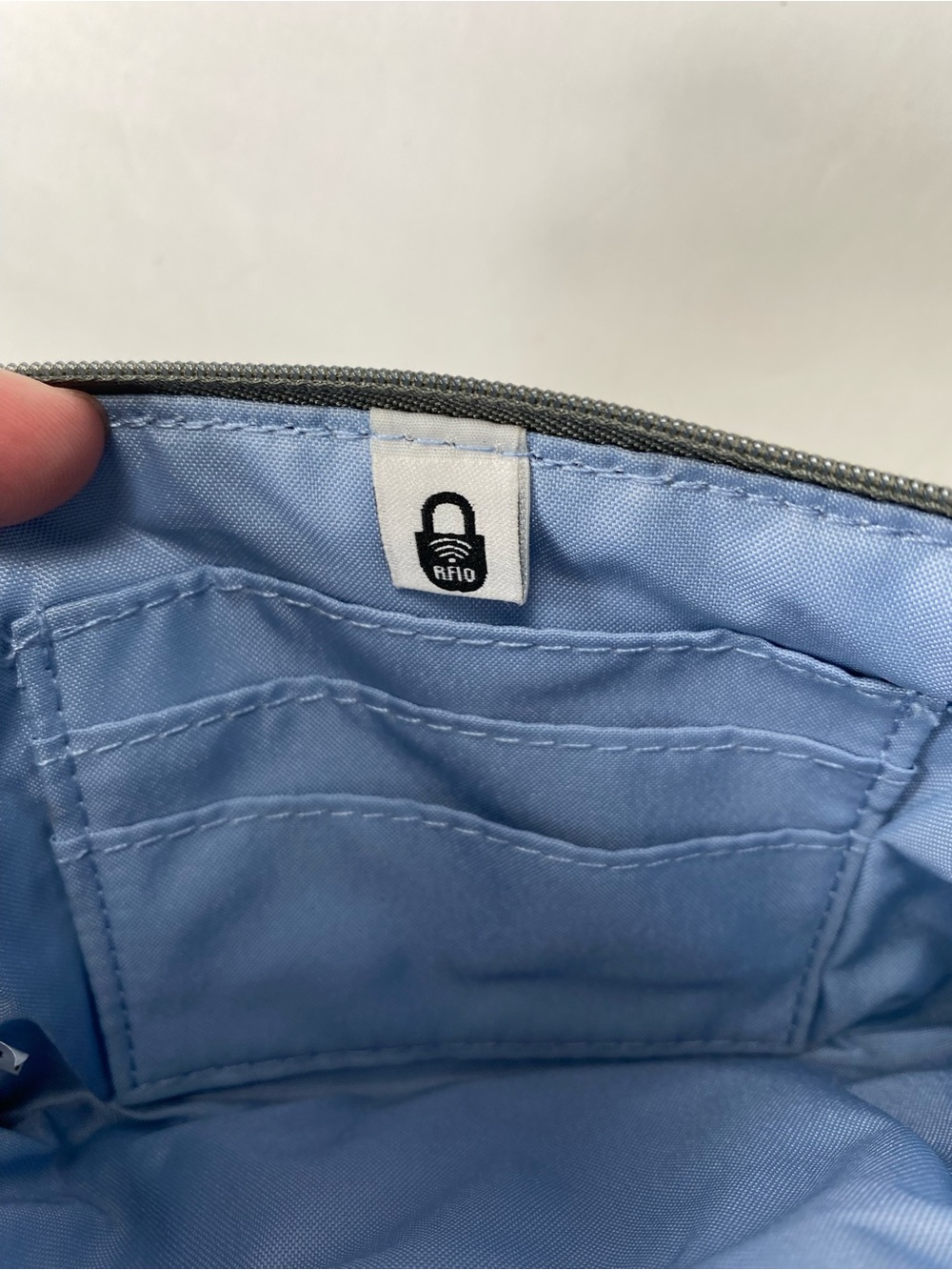 Baggallini Deep Purple Light Blue Wristlet with Strap - Picture 8 of 12